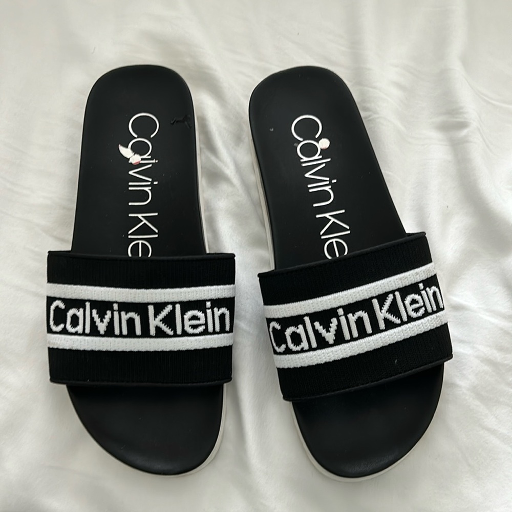 Calvin Klein black slides size 9